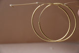 Giant round ear hoops