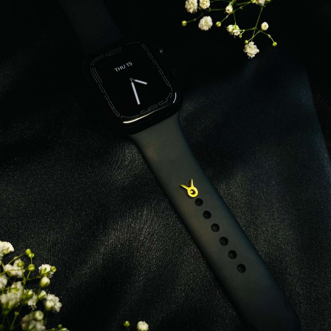 Taurus watch button