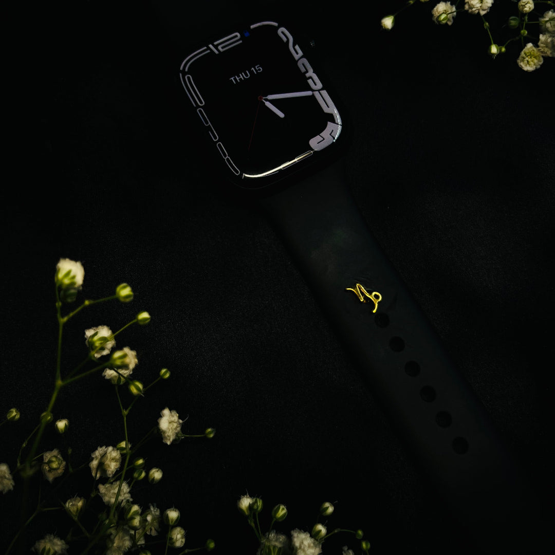 Capricorn watch button