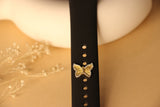 Butterfly bordered cz watch button