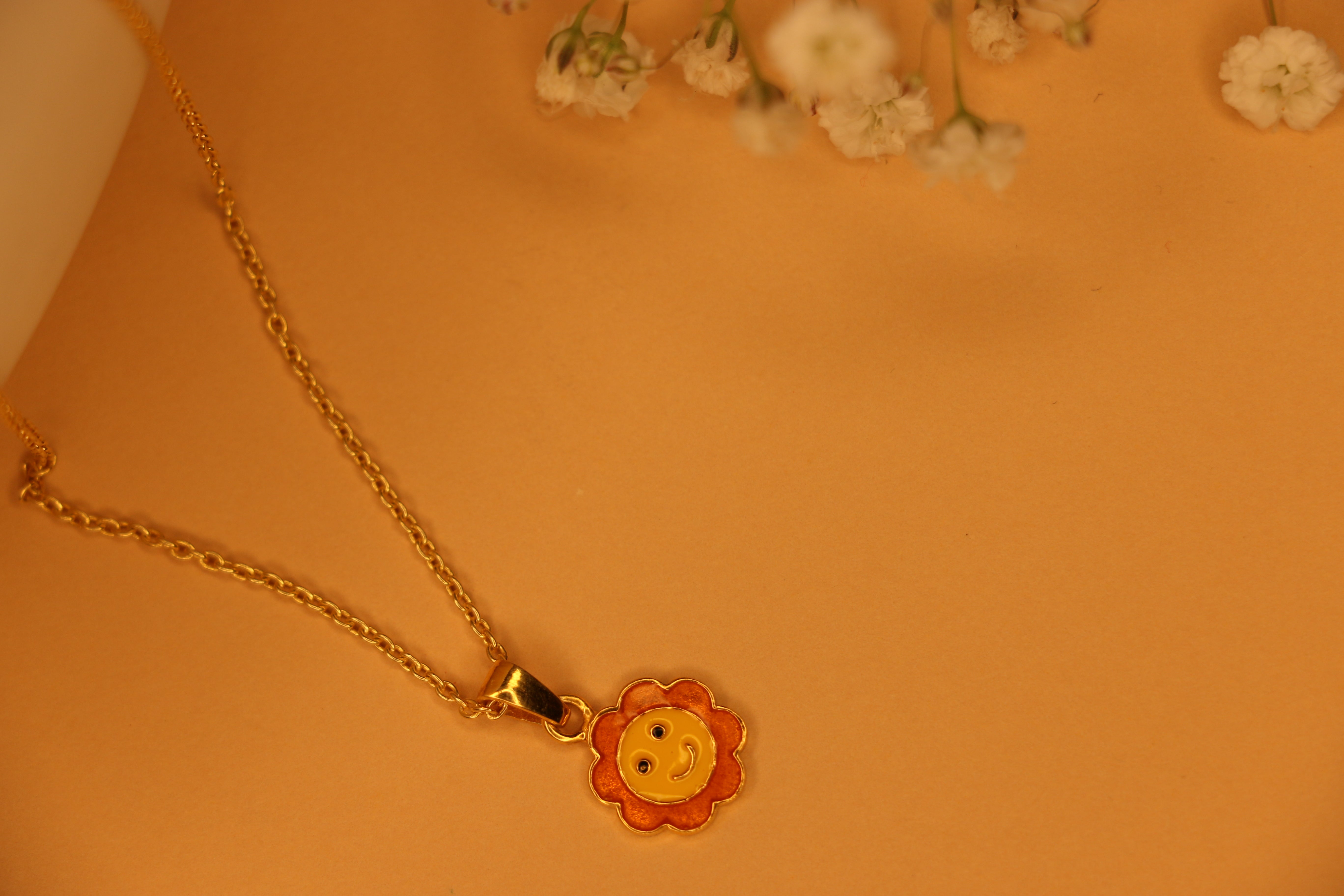Sun charm necklace