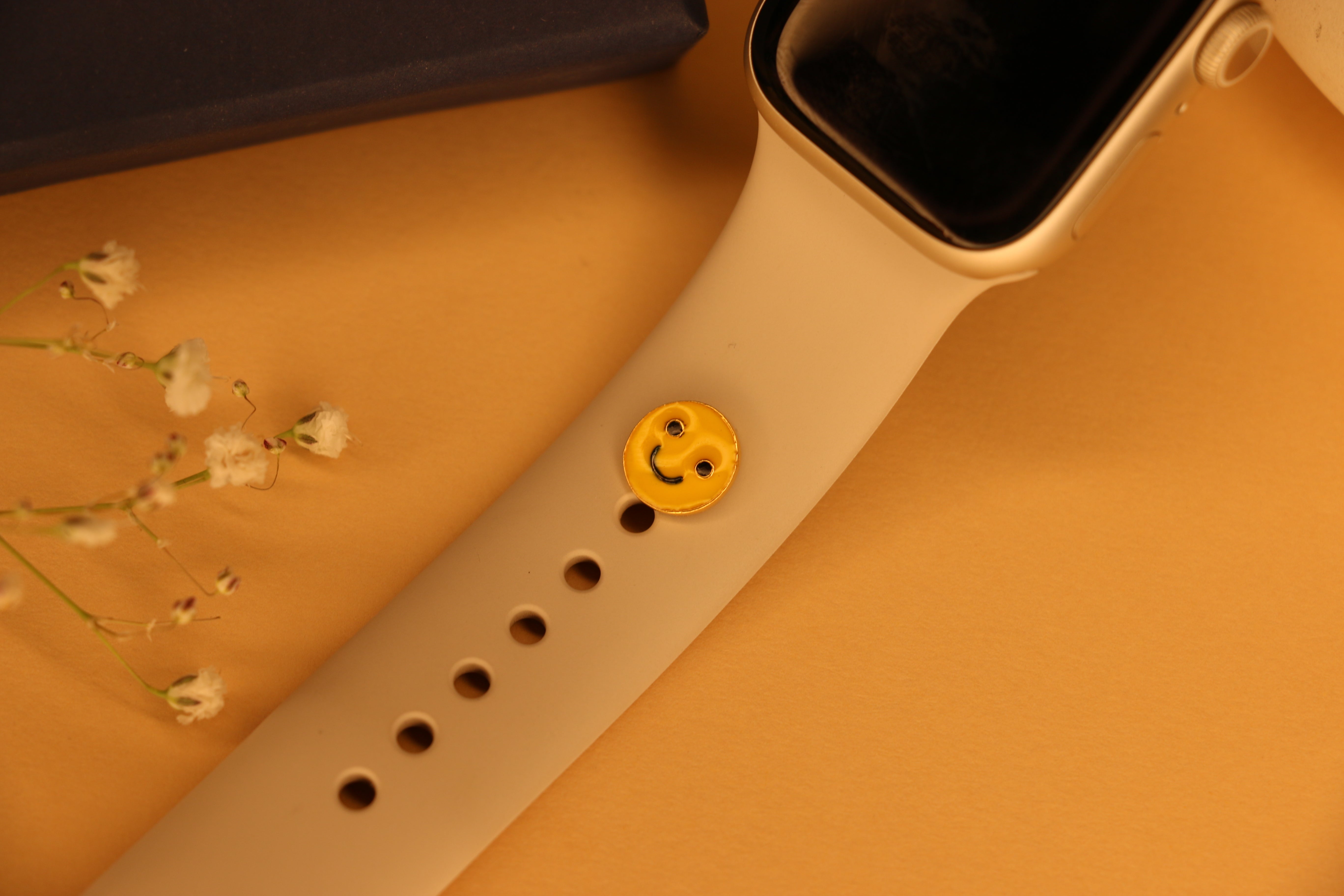 Smiley watch button