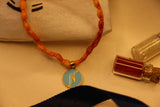 Pastel Blue Enamelled Alphabets versatile pendant rakhi