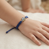 Car 92.5 Silver rakhi in blue thread