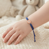 Evil Eye pink 92.5 Silver rakhi in blue thread