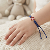 Flower 92.5 Silver rakhi in blue thread