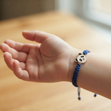 Panda 92.5 Silver rakhi in blue thread