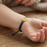 Smiley 92.5 Silver rakhi in blue thread