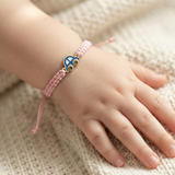 Car 92.5 Silver rakhi in pink thread