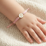 Om Enamel White 92.5 Silver rakhi in pink thread