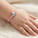 Peppa Pig 92.5 Silver rakhi in pink thread