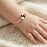 Yin Yang 92.5 Silver rakhi in pink thread